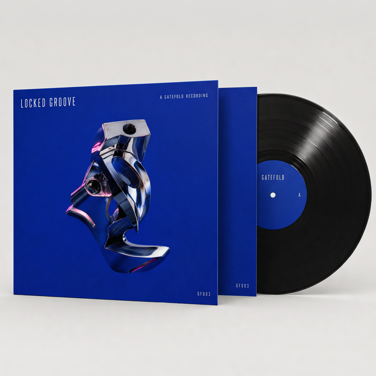 Locked Groove EP: cobalt sleeve with a chrome object, black record half out of the sleeve