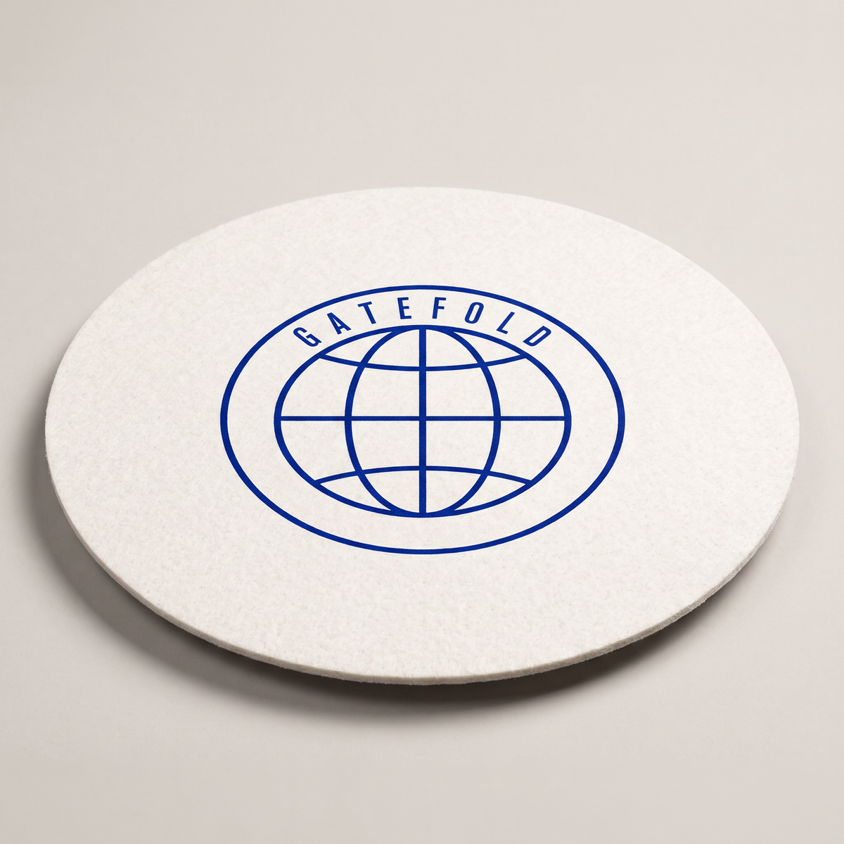 Off-white felt turntable slipmat printed with the GATEFOLD globe roundel in cobalt
